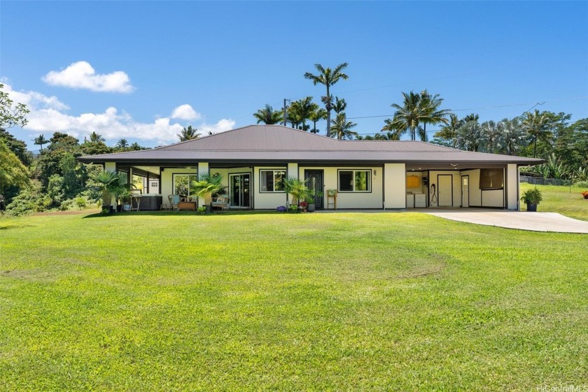 The buyer is trying to sell their home first. This newer 2023 - Beach Home for sale in Papaikou, Hawaii on Beachhouse.com