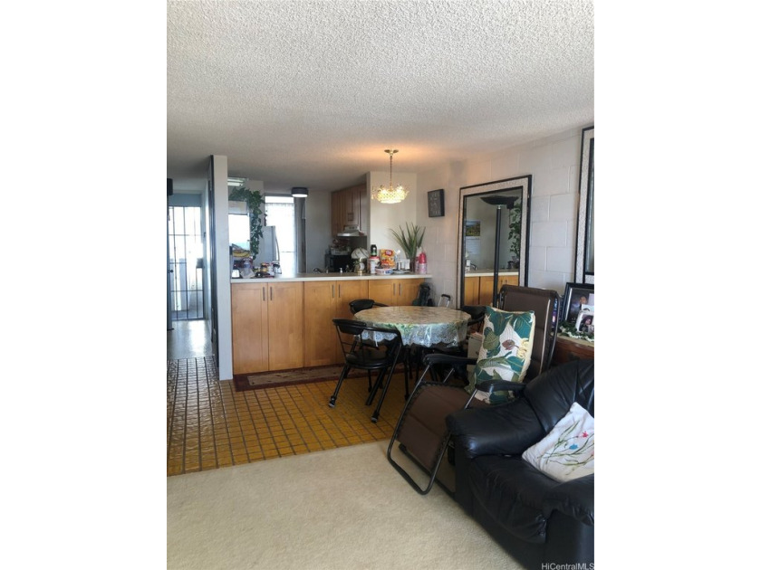 This 2 bed, 1 bath 1 parking unit in Kunawai Terrace has been - Beach Condo for sale in Honolulu, Hawaii on Beachhouse.com