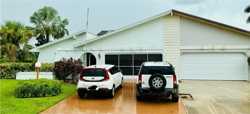 Discover this well-maintained rear southern exposure attached - Beach Home for sale in Lehigh Acres, Florida on Beachhouse.com