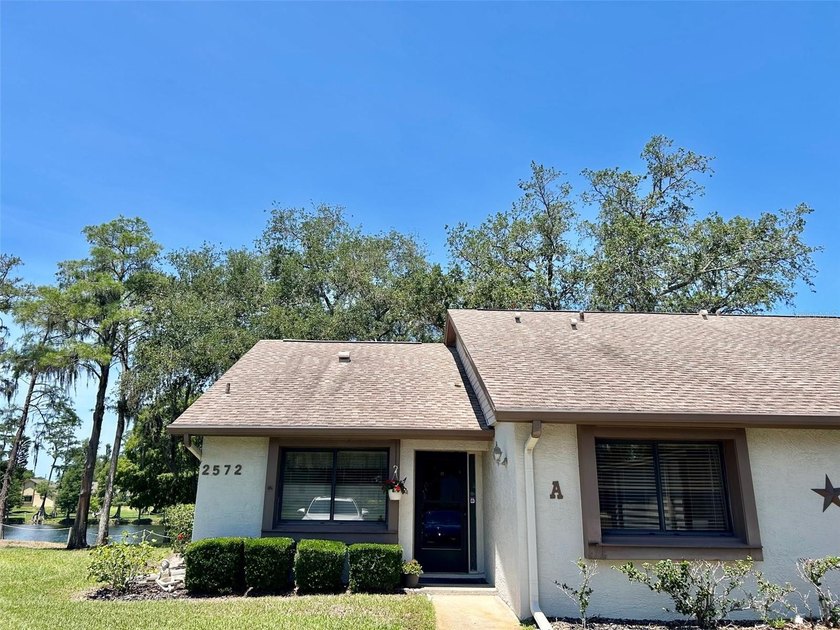 Welcome to the desirable 55+ community of Village On The Green! - Beach Home for sale in Clearwater, Florida on Beachhouse.com