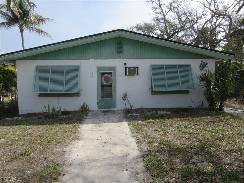Opportunity awaits on Fort Myers Beach! This canal-front - Beach Home for sale in Fort Myers Beach, Florida on Beachhouse.com