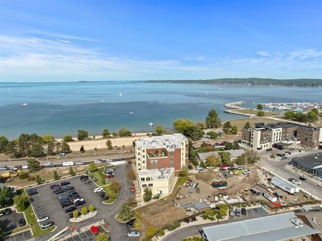 Step into luxury with this one-of-a-kind 3 bedroom, 3 bathroom - Beach Condo for sale in Traverse City, Michigan on Beachhouse.com