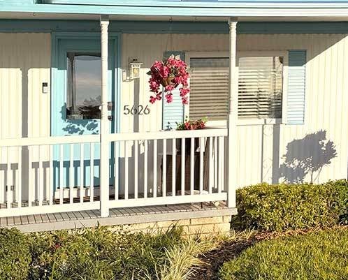 AS YOU DRIVE UP, YOU'LL NOTE THE SPACIOUS DOUBLE DRIVEWAY AND - Beach Home for sale in New Port Richey, Florida on Beachhouse.com