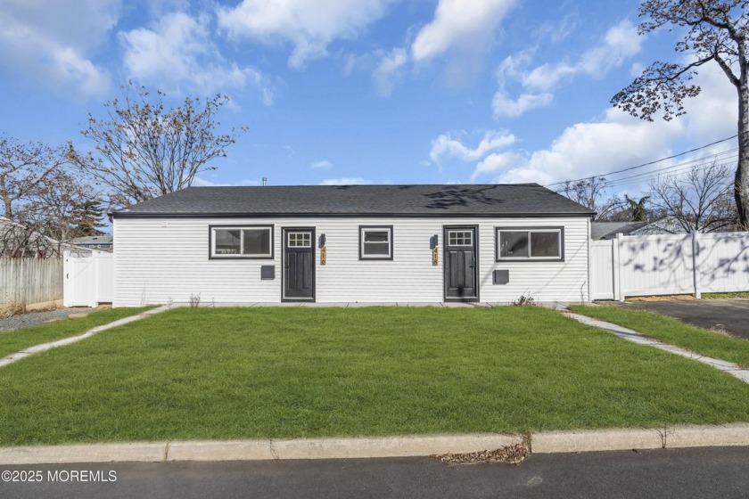 This sleek and stylish side-by-side 2-family duplex is located - Beach Townhome/Townhouse for sale in Keyport, New Jersey on Beachhouse.com