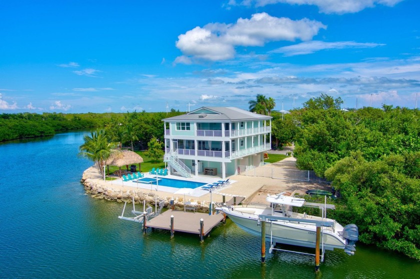 Endless Sunset Views over an extra-wide deep draft lagoon, with - Beach Home for sale in Marathon, Florida on Beachhouse.com