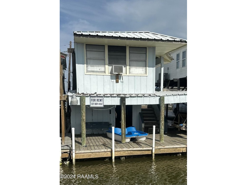 Located in the hotly desired community of Coco Marina, this camp - Beach Home for sale in Chauvin, Louisiana on Beachhouse.com