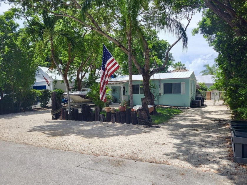 Embrace island living in this beautifully updated, HOA-free - Beach Home for sale in Key Largo, Florida on Beachhouse.com