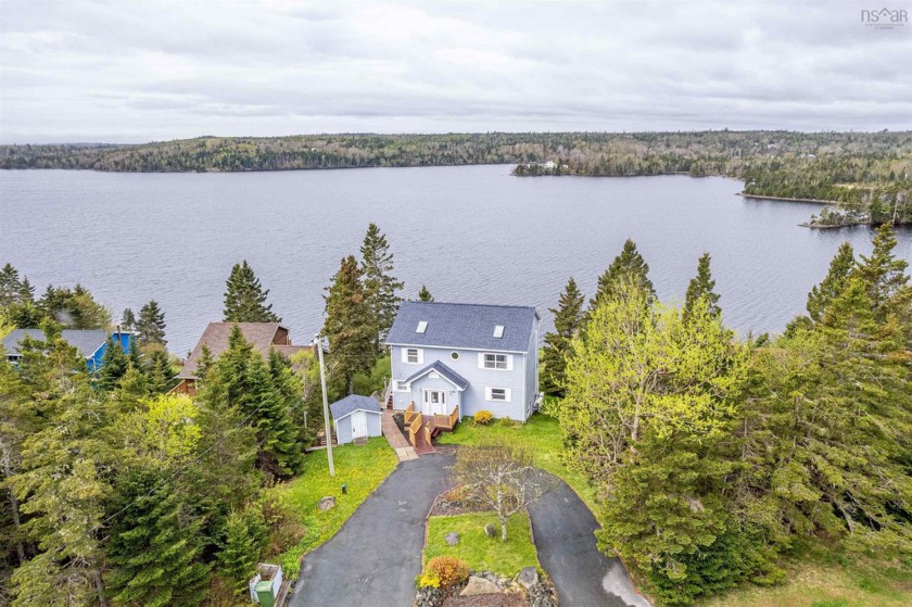Welcome to this exceptional lakefront home offering 78 feet of - Beach Home for sale in Lawrencetown,  on Beachhouse.com