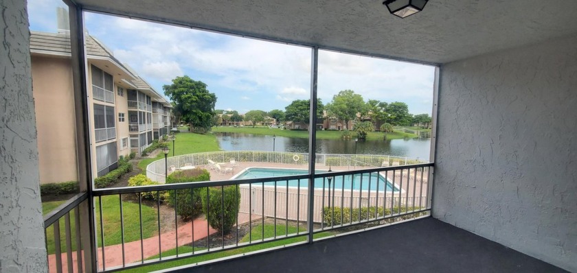 COMPLETLY REMODELED 2ND FLOOR UNIT OVERLOOKING THE POOL AND THE - Beach Condo for sale in Coral Springs, Florida on Beachhouse.com