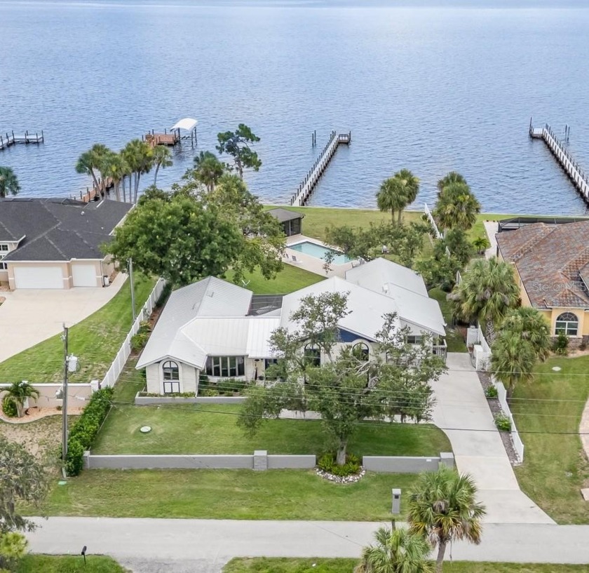 Introducing an extraordinary waterfront retreat at 4460 - Beach Home for sale in Punta Gorda, Florida on Beachhouse.com