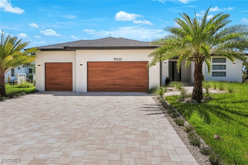 This exceptional 4-bedroom, 3-bathroom Gulf-access pool home - Beach Home for sale in Cape Coral, Florida on Beachhouse.com