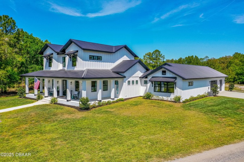Welcome to this extraordinary farmhouse estate, nestled on 7.9 - Beach Home for sale in New Smyrna Beach, Florida on Beachhouse.com