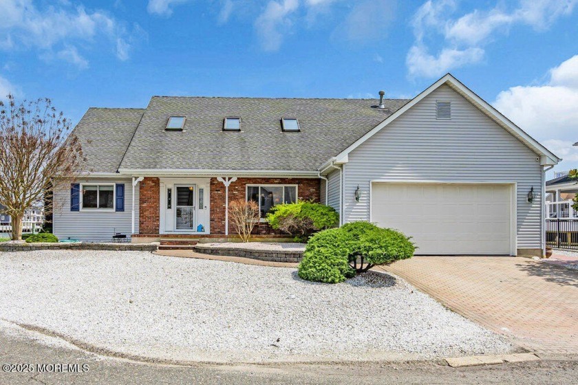 Stunning 3,100 sq ft waterfront Cape just one lagoon from the - Beach Home for sale in Forked River, New Jersey on Beachhouse.com