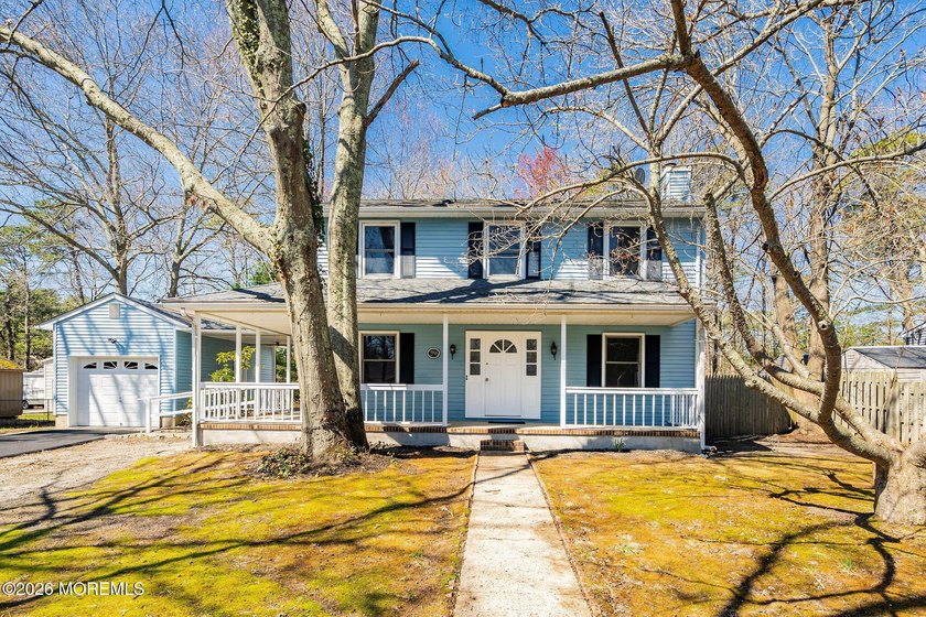 Beautiful 2 Story Colonial with a wrap-around deck and covered - Beach Home for sale in Bayville, New Jersey on Beachhouse.com