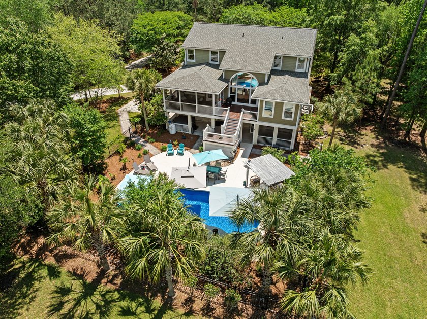 Set on nearly two acres along the 11th tee of Dunes West, this - Beach Home for sale in Mount Pleasant, South Carolina on Beachhouse.com