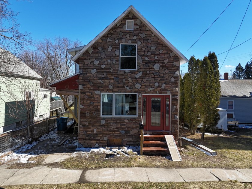 This total-rehab home is the perfect opportunity for someone - Beach Home for sale in Manistee, Michigan on Beachhouse.com