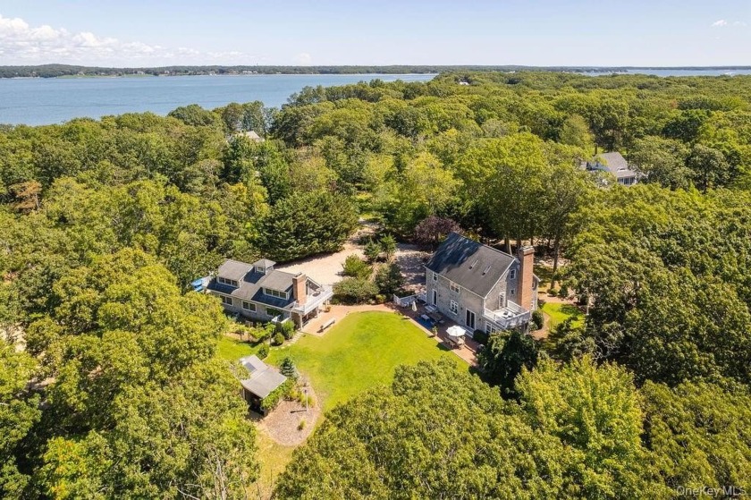 Set on over two secluded acres within the coveted Shellfisher - Beach Home for sale in Southold, New York on Beachhouse.com