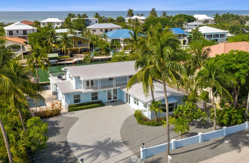 Welcome to this stunning canal-front estate in prestigious Duck - Beach Home for sale in Duck Key, Florida on Beachhouse.com