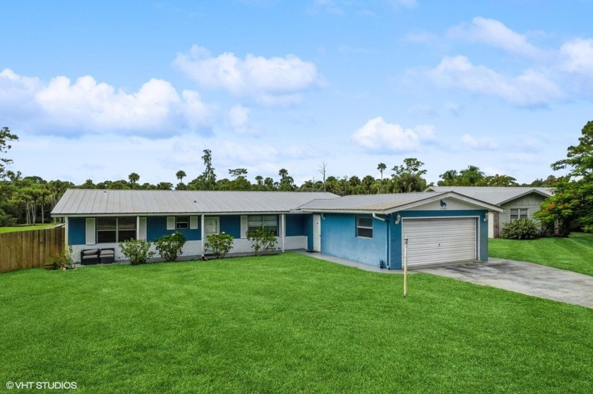 3 bedroom 2 and 1/2 bath pool home fixer upper with 2 car garage - Beach Home for sale in Palm City, Florida on Beachhouse.com