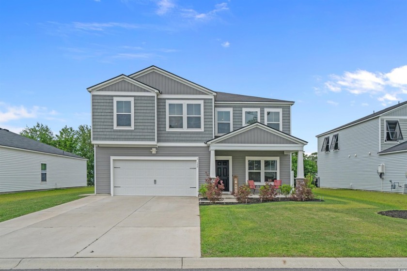 Welcome to this beautifully maintained 6-bedroom, 3-bath home - Beach Home for sale in Surfside Beach, South Carolina on Beachhouse.com