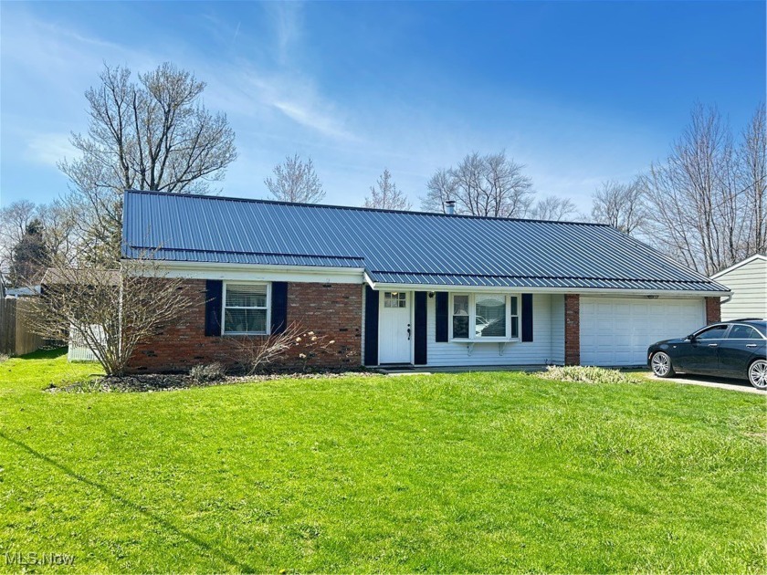 Welcome to easy, one-floor living in the heart of Madison! This - Beach Home for sale in Madison, Ohio on Beachhouse.com