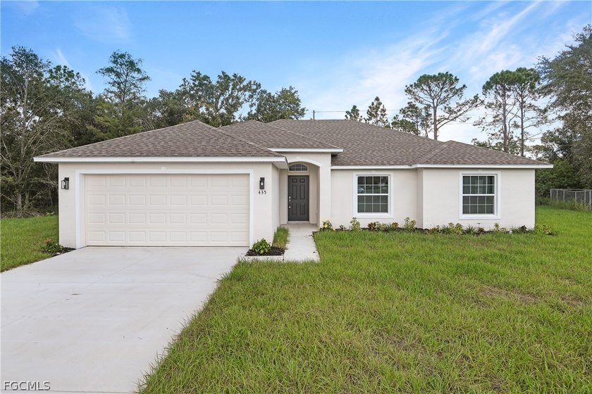 Discover modern Florida living in this beautifully crafted new - Beach Home for sale in Lehigh Acres, Florida on Beachhouse.com