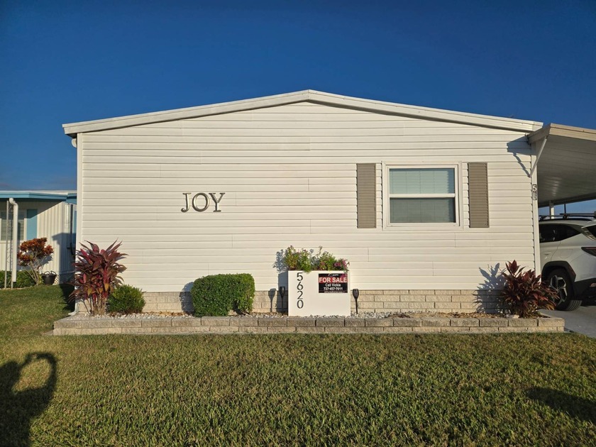 AS SOON AS YOU ENTER, YOU'LL NOTICE THE NEW LUXURY VINYL FLOORS - Beach Home for sale in New Port Richey, Florida on Beachhouse.com