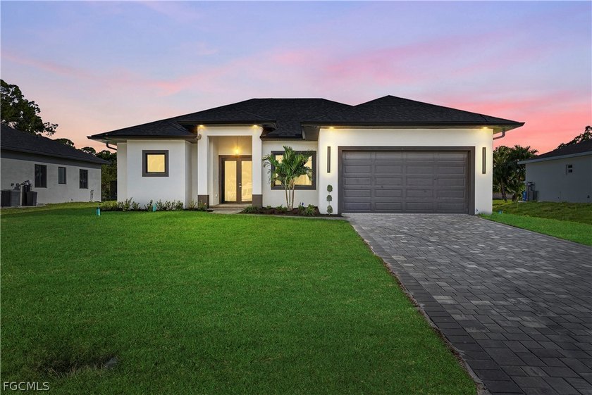 Discover this new construction home in Lehigh Acres offering - Beach Home for sale in Lehigh Acres, Florida on Beachhouse.com