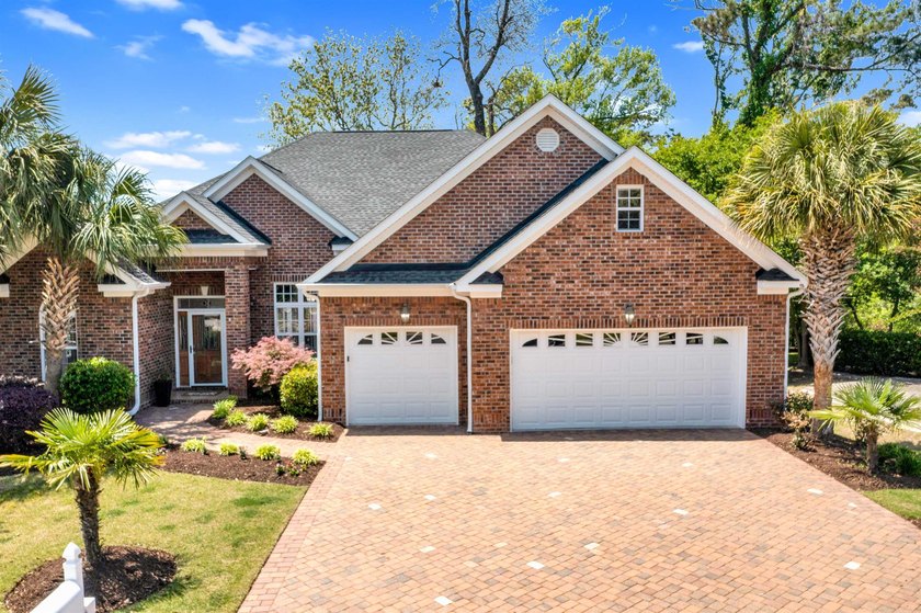 This immaculate 4-bedroom, 3-bath all-brick home is a must-see - Beach Home for sale in North Myrtle Beach, South Carolina on Beachhouse.com