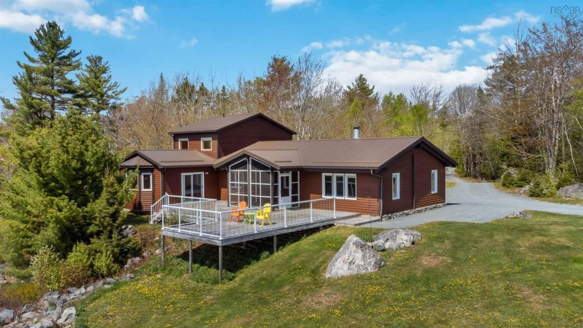 Nestled down a gated grade-A driveway that loops around, you'll - Beach Home for sale in Mill Village,  on Beachhouse.com