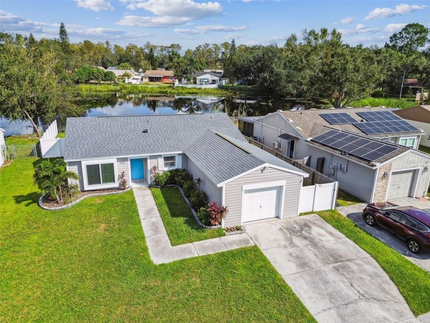 Welcome Home to this serene water view right in the middle of - Beach Home for sale in Tampa, Florida on Beachhouse.com