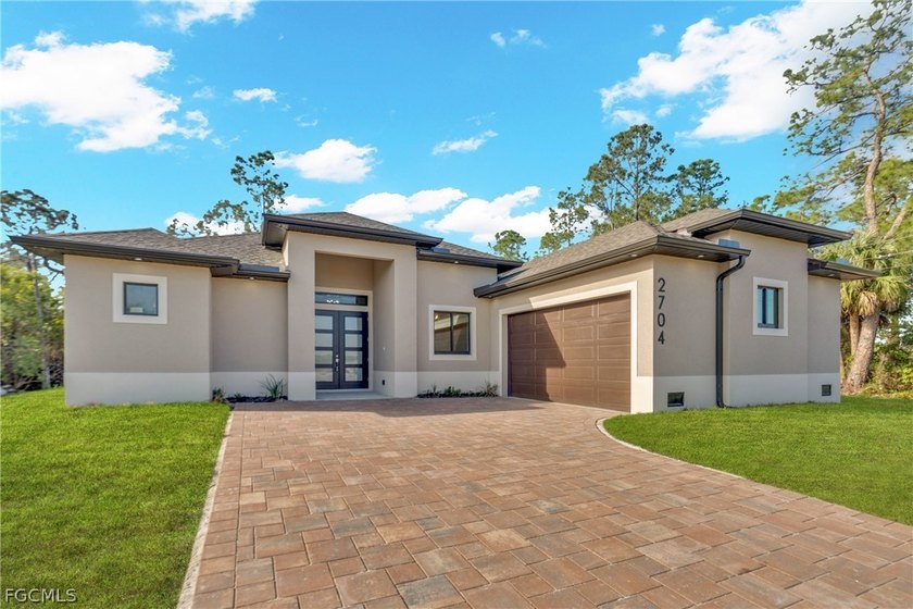 JUST COMPLETED--CO ISSUED, UPGRADED NEW CONSTRUCTION with MODERN - Beach Home for sale in Lehigh Acres, Florida on Beachhouse.com