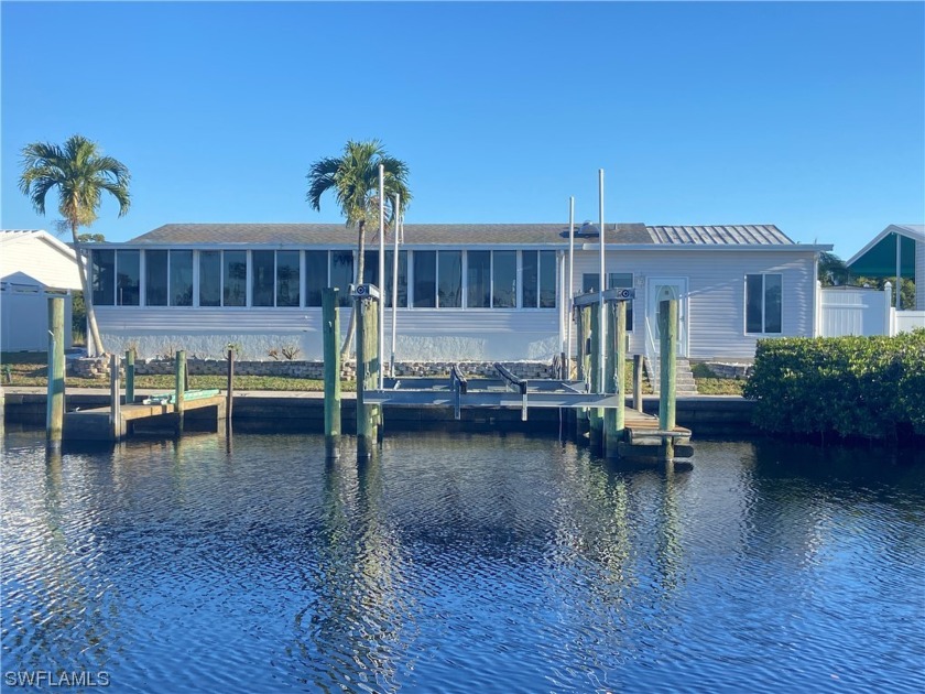 Welcome to your dream waterfront oasis nestled on an island in - Beach Home for sale in North Fort Myers, Florida on Beachhouse.com