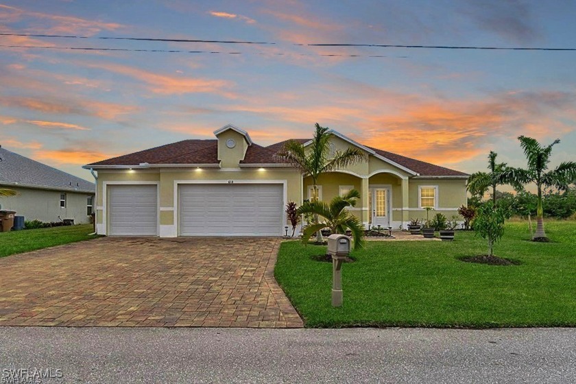 This stunning canal-front pool home offers the perfect blend of - Beach Home for sale in Cape Coral, Florida on Beachhouse.com