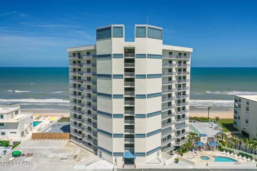 Oceanfront awesomeness. SERIOUSLY. This 2 bedroom, 2 bath DIRECT - Beach Condo for sale in New Smyrna Beach, Florida on Beachhouse.com