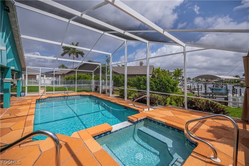 HUGE PRICE REDUCTION!! Spacious pool home on an oversized corner - Beach Home for sale in Cape Coral, Florida on Beachhouse.com