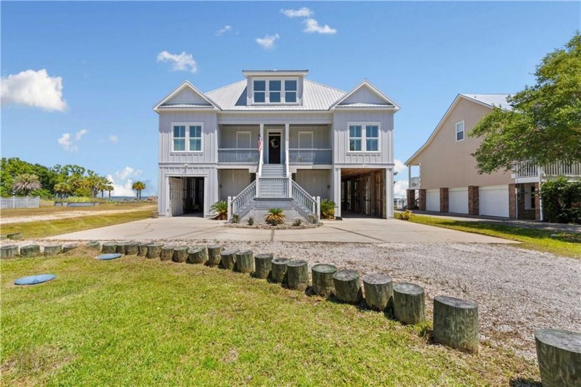 Welcome to your dream home on Mobile Bay! This home is - Beach Home for sale in Coden, Alabama on Beachhouse.com