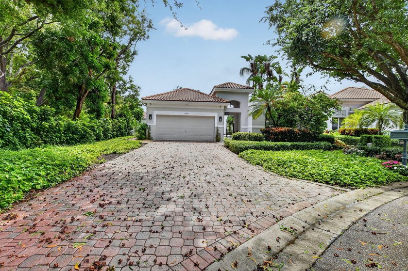 Welcome to an exceptional 2 story courtyard residence that also - Beach Home for sale in Boca Raton, Florida on Beachhouse.com