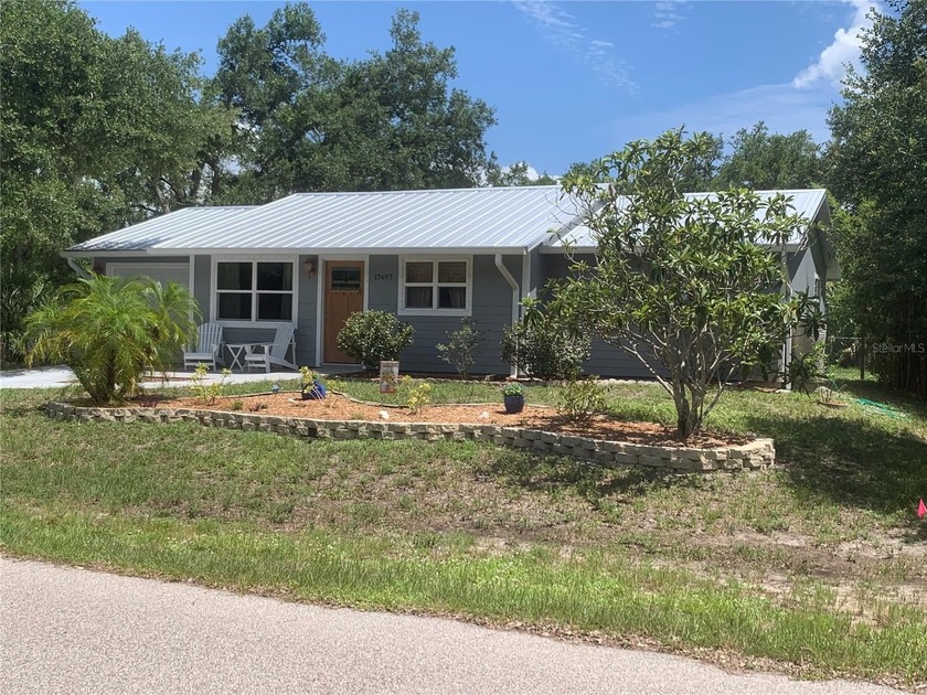 This charming and immaculate SOLAR POWERED 2 bedroom, 2 bath - Beach Home for sale in Port Charlotte, Florida on Beachhouse.com