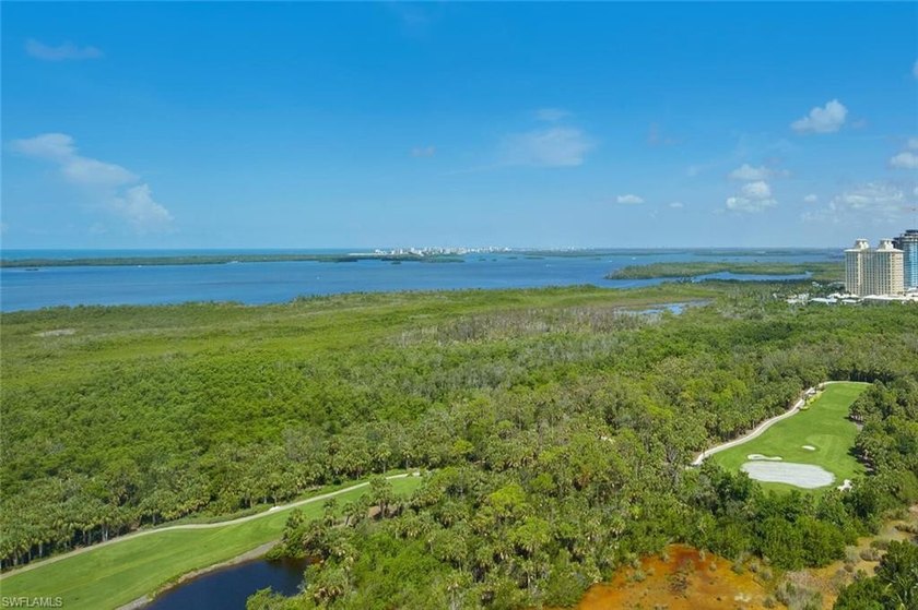 This rare end-unit residence offers an unparalleled perspective - Beach Condo for sale in Estero, Florida on Beachhouse.com