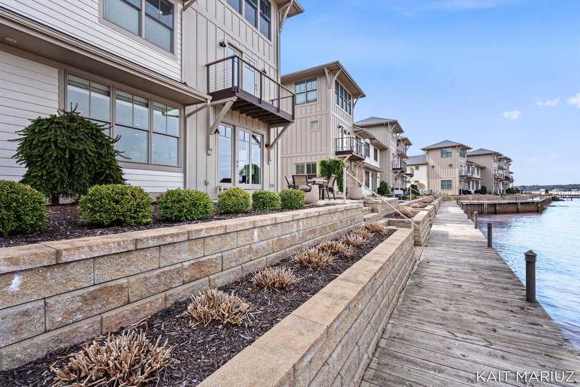 Experience luxury lakefront living on Lake Macatawa. This - Beach Condo for sale in Holland, Michigan on Beachhouse.com