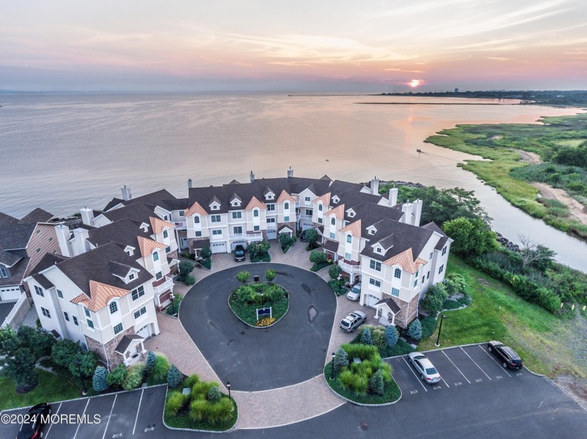 Indulge in waterfront luxury with this captivating townhome - Beach Home for sale in Union Beach, New Jersey on Beachhouse.com