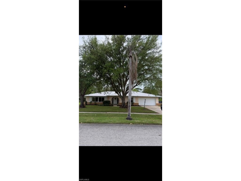 Picture beginning your day in a bright, sun-filled Florida room - Beach Home for sale in North Fort Myers, Florida on Beachhouse.com