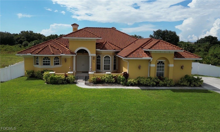 This spacious, well-maintained custom-built Mediterranean-style - Beach Home for sale in Lehigh Acres, Florida on Beachhouse.com