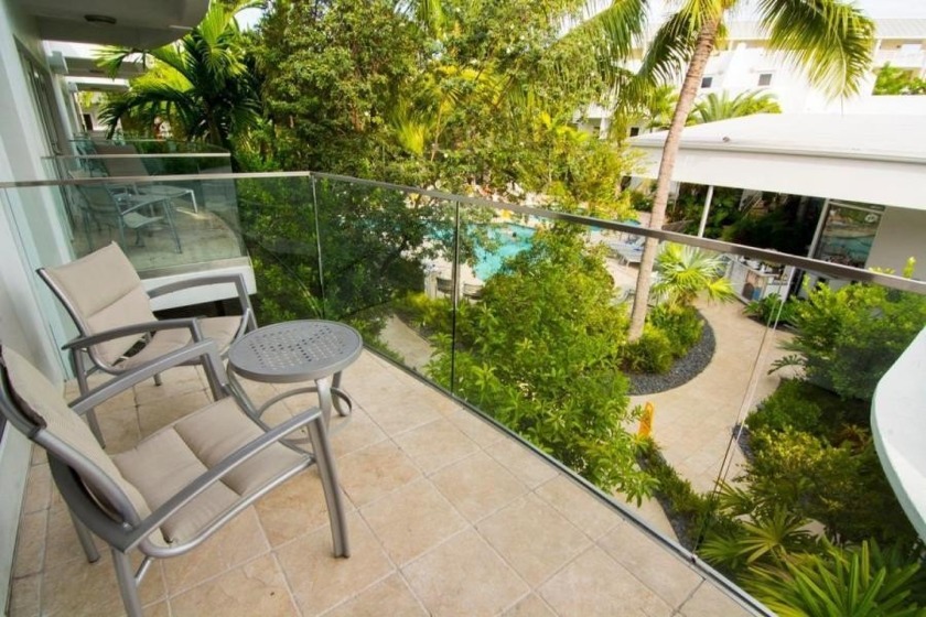 This second-floor luxury condo is ideally situated just one - Beach Condo for sale in Key West, Florida on Beachhouse.com