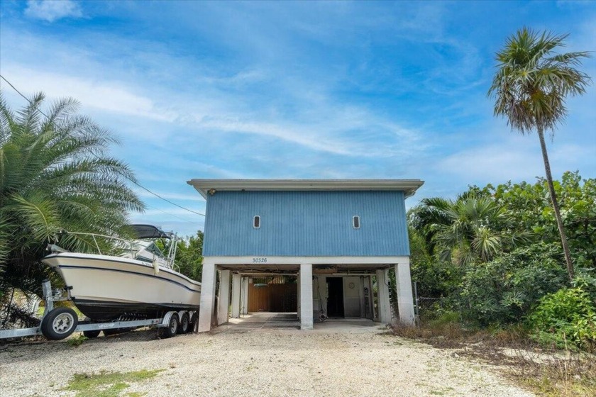 This 2-bedroom, 2-bathroom fixer-upper in the desirable Palm - Beach Home for sale in Big Pine Key, Florida on Beachhouse.com