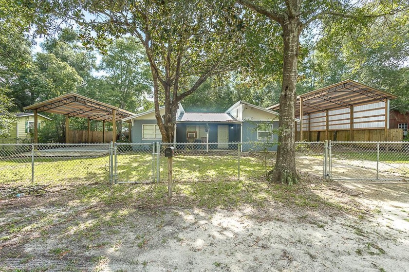 Fisherman or Outdoorsman's Paradise!  This home has been updated - Beach Home for sale in Carabelle, Florida on Beachhouse.com
