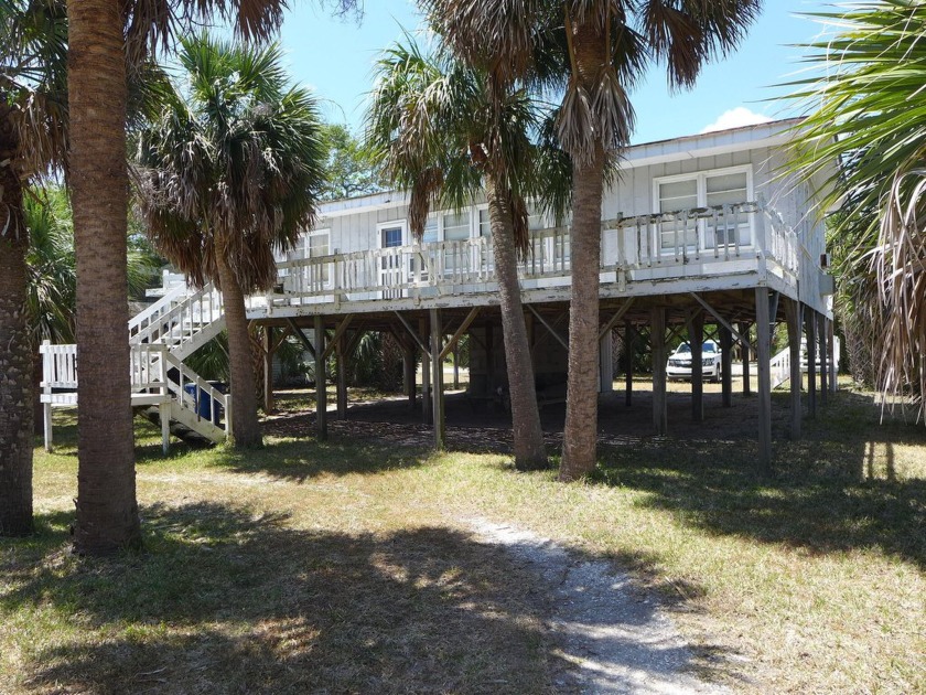 Classic 1960's 2nd row cottage on the beach side of Palmetto - Beach Home for sale in Edisto Island, South Carolina on Beachhouse.com