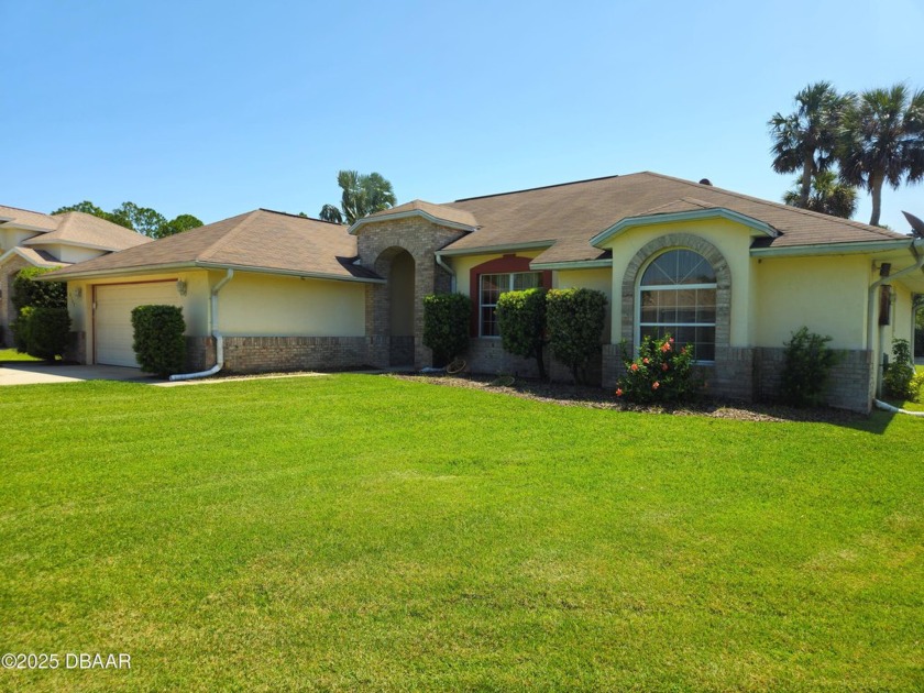 Welcome to this charming home nestled in the beautiful, wooded - Beach Home for sale in Port Orange, Florida on Beachhouse.com