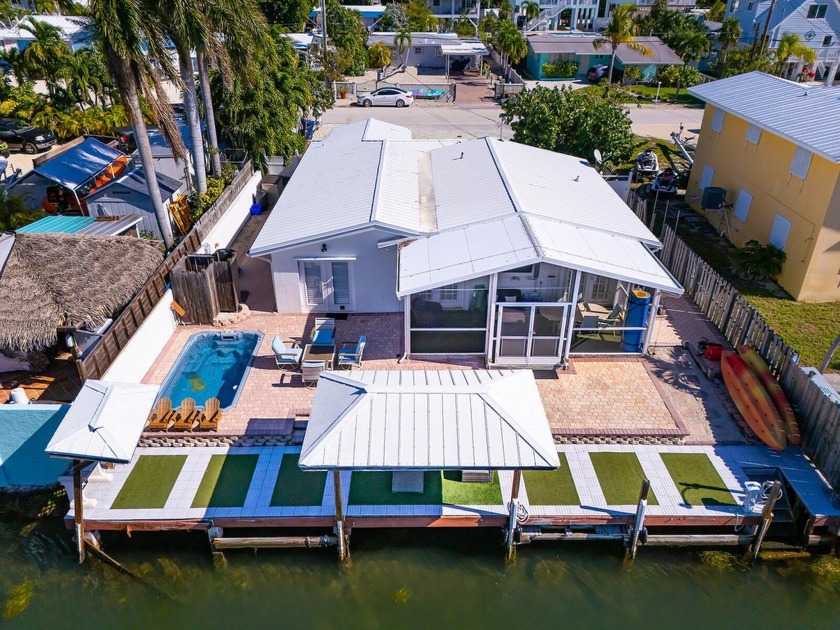 This stunning waterfront property is an ideal coastal retreat - Beach Home for sale in Marathon, Florida on Beachhouse.com